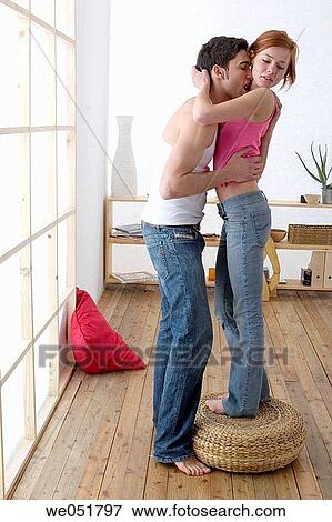 Stock Photo - at-home, bonding, bond, attraction, 20's. Fotosearch