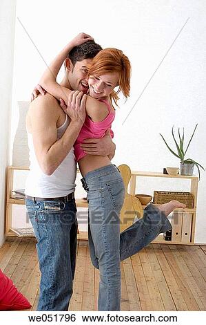 Stock Photograph - at-home, bonding, bond, attraction, 20's. Fotosearch