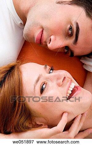 Stock Photo - attraction, bonding, bond, black hair, affection. Fotosearch