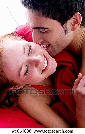 Stock Photo - attraction, Close-up, 20's. Fotosearch