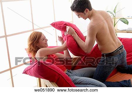 Stock Image - attraction, complicity, 20's. Fotosearch