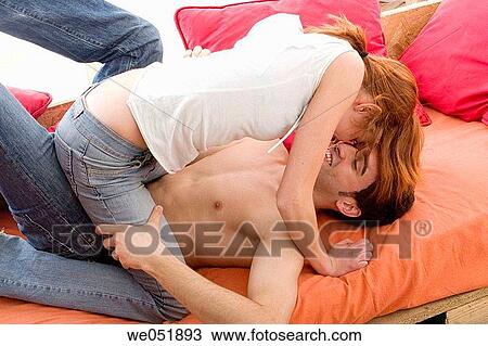 attraction, complicity, 20's View Large Photo Image Stock Image - attraction, complicity, 20's. Fotosearch