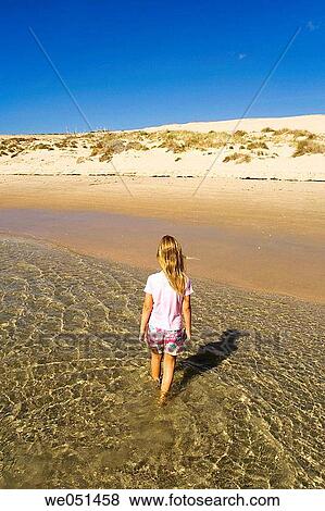 back view, barefoot, beach, blond, calm View Large Photo Image Stock Photo - back view, barefoot, beach, blond, calm. Fotosearch