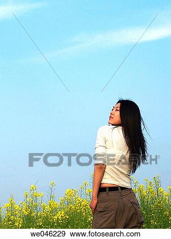 back view, brunette, blue sky, blue, Asian View Large Photo Image Stock Photo - back view, brunette, blue sky, blue, Asian. Fotosearch