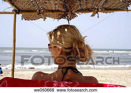 Stock Photo - back view, calm, beach, 20. Fotosearch
