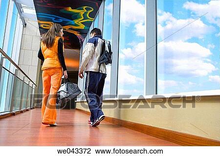 Stock Image - back view, chat, bag, 30's. Fotosearch