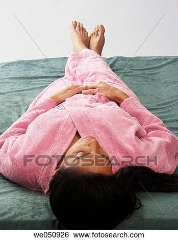 barefoot, bathrobe, bed, calm, chilling out View Large Photo Image Stock Photograph - barefoot, bathrobe, bed, calm, chilling out. Fotosearch