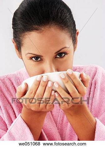 Stock Photo - bathrobe, beauty, bowl, brunette, Close-up. Fotosearch