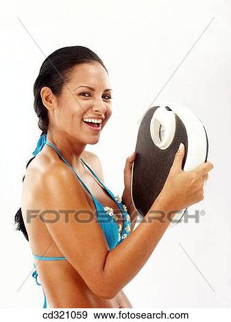 Bathroom scale, clipping path, brunette, 20's View Large Photo Image Stock Photo - Bathroom scale, clipping path, brunette, 20's. Fotosearch