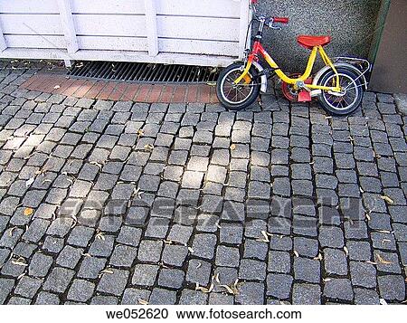 bicycle, childhood, cobble, cobblestone, concept View Large Photo Image Stock Image - bicycle, childhood, cobble, cobblestone, concept. Fotosearch
