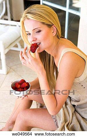 bite, bowl, blond, biting, at-home View Large Photo Image Picture - bite, bowl, blond, biting, at-home. Fotosearch