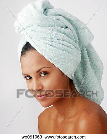 Stock Image - Body care, brunette, carnality, clipping path. Fotosearch
