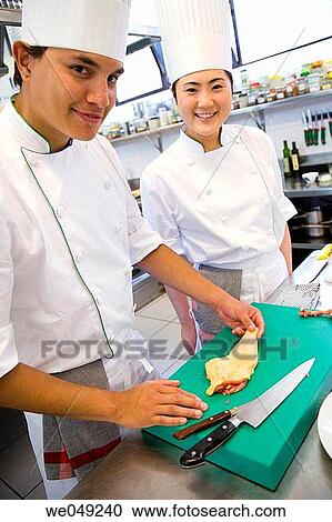 Boning chicken thigs. Luis Irizar cooking school. Donostia, Gipuzkoa, Basque Country, Spain View Large Photo Image Stock Image - Boning chicken thigs. Luis Irizar cooking school. Donostia, Gipuzkoa, Basque Country, Spain. Fotosearch