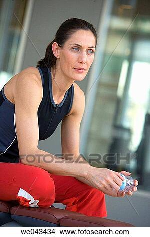 bottle, brunette, break-time, break, absorbed View Large Photo Image Picture - bottle, brunette, break-time, break, absorbed. Fotosearch