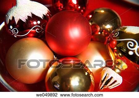 Stock Image - Bowl of Christmas ornaments. Fotosearch