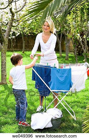 boy, bucket, child, clothesline View Large Photo Image Stock Photograph - boy, bucket, child, clothesline. Fotosearch