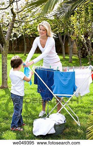 boy, bucket, child, clothesline View Large Photo Image Stock Photography - boy, bucket, child, clothesline. Fotosearch