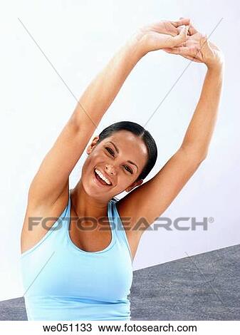 Stock Image - brunette, clipping path, carefree, Arms raised. Fotosearch