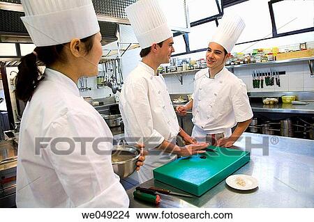 Picture - Chefs chopping up black pepper. Luis Irizar cooking school. Donostia, Gipuzkoa, Basque Country, Spain. Fotosearch