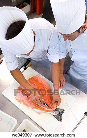 Chefs cutting salmon. Luis Irizar cooking school. Donostia, Gipuzkoa, Basque Country, Spain View Large Photo Image Stock Photo - Chefs cutting salmon. Luis Irizar cooking school. Donostia, Gipuzkoa, Basque Country, Spain. Fotosearch