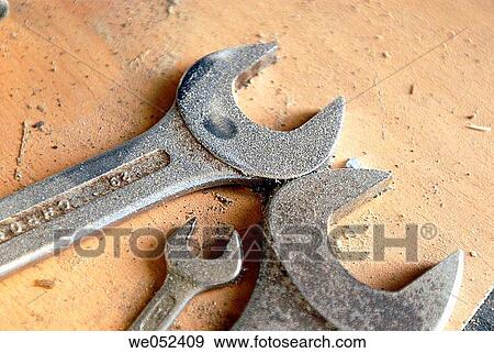 Stock Photo - Close-up, industry, indoors, dust, Adjustable wrench. Fotosearch