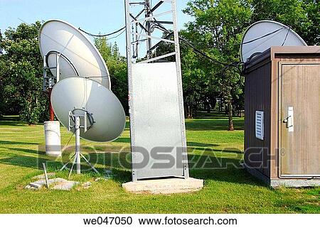 communication disks and electrical tower near a residental area View Large Photo Image Stock Image - communication disks and electrical tower near a residental area. Fotosearch