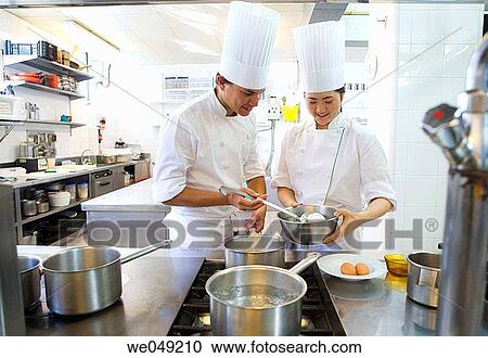 Cooking poached eggs. Luis Irizar cooking school. Donostia, Gipuzkoa, Basque Country, Spain View Large Photo Image Stock Image - Cooking poached eggs. Luis Irizar cooking school. Donostia, Gipuzkoa, Basque Country, Spain. Fotosearch