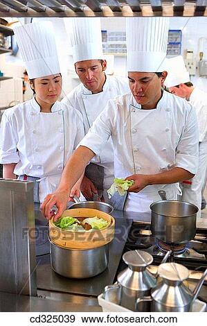 Stock Photo - Cooking vegetables. Luis Irizar cooking school. Donostia, Gipuzkoa, Basque Country, Spain. Fotosearch