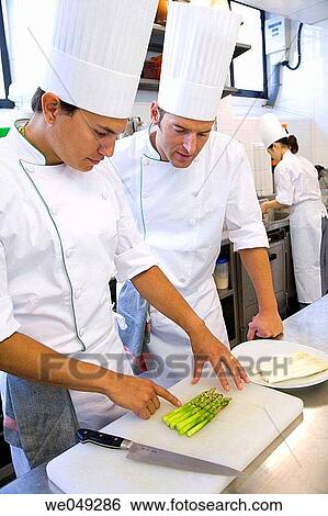 Stock Photograph - Cutting asparagus. Luis Irizar cooking school. Donostia, Gipuzkoa, Basque Country, Spain. Fotosearch