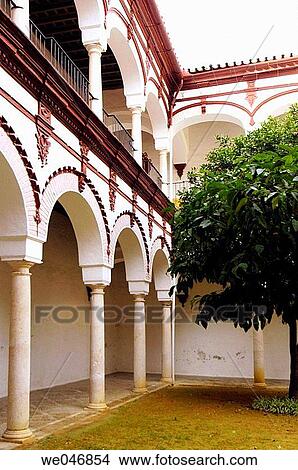 Decorated archways of Palacio interior courtyard. Ecija. Andalusia. Spain View Large Photo Image Picture - Decorated archways of Palacio interior courtyard. Ecija. Andalusia. Spain. Fotosearch