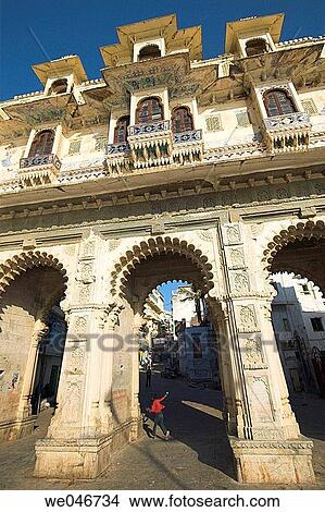 Facade Detail of carved stonework window casements on the Tripolia Gate of Gangaur Ghat. Udaipur. Rajasthan. India View Large Photo Image Picture - Facade Detail of carved stonework window casements on the Tripolia Gate of Gangaur Ghat. Udaipur. Rajasthan. India. Fotosearch