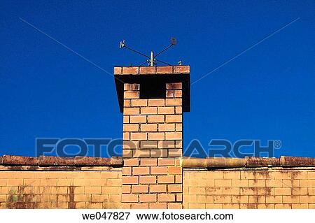 Factory chimney and compass ( cardinals ) View Large Photo Image Stock Photo - Factory chimney and compass ( cardinals ). Fotosearch
