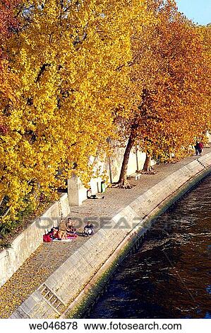 Stock Photo - Fall colors on the river banks. Paris. France. Fotosearch