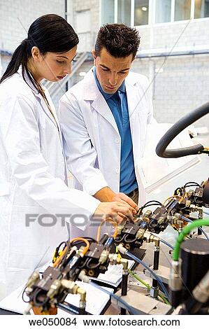 Fatronik Research Centre, San Sebastian Technological Park, Donostia, Gipuzkoa, Basque Country. Advanced industrial robotic system, final assembly of the motor drive. View Large Photo Image Picture - Fatronik Research Centre, San Sebastian Technological Park, Donostia, Gipuzkoa, Basque Country. Advanced industrial robotic system, final assembly of the motor drive.. Fotosearch