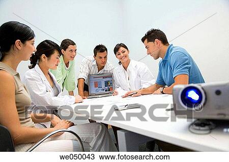 Stock Image - Fatronik Research Centre, San Sebastian Technological Park, Donostia, Gipuzkoa, Basque Country. Businesspeople/technicians in meeting room. Fotosearch