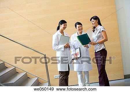 Stock Photo - Fatronik Research Centre, San Sebastian Technological Park, Donostia, Gipuzkoa, Basque Country. Businesswoman and technicians. Fotosearch