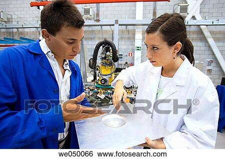 Fatronik Research Centre, San Sebastian Technological Park, Donostia, Gipuzkoa, Basque Country. Technicians checking a part manufactured y means of Incremental Sheet Forming (ISF) technology. View Large Photo Image Stock Photograph - Fatronik Research Centre, San Sebastian Technological Park, Donostia, Gipuzkoa, Basque Country. Technicians checking a part manufactured y means of Incremental Sheet Forming (ISF) technology.. Fotosearch