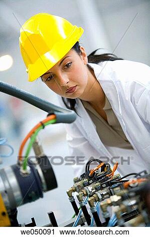 Stock Image - Gipuzkoa, Basque Country. Advanced industrial robotic system, final assembly of the motor drive.. Fotosearch