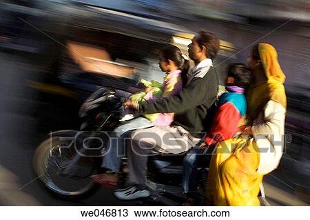 Indian family on speeding motorcycle. Udaipur. Rajasthan. India. View Large Photo Image Stock Image - Indian family on speeding motorcycle. Udaipur. Rajasthan. India.. Fotosearch