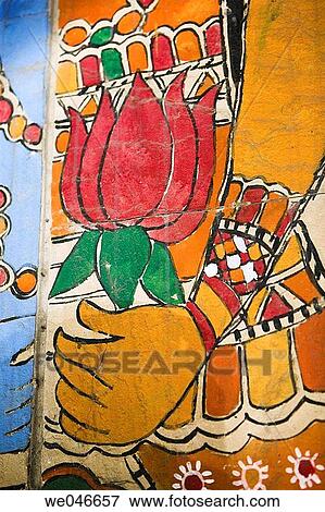 Indian painting of hand holding lotus flower. New Delhi. India. View Large Photo Image Stock Photo - Indian painting of hand holding lotus flower. New Delhi. India.. Fotosearch