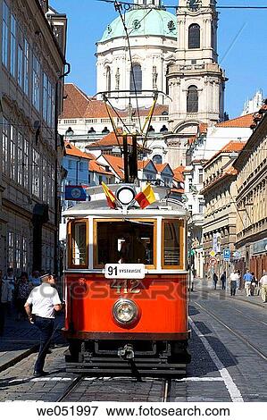 Karmelitska street. Saint Nicolaus church and a streetcar. Prague. Czech Republic View Large Photo Image Stock Photo - Karmelitska street. Saint Nicolaus church and a streetcar. Prague. Czech Republic. Fotosearch