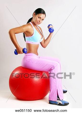Latin woman at gym View Large Photo Image Stock Image - Latin woman at gym. Fotosearch
