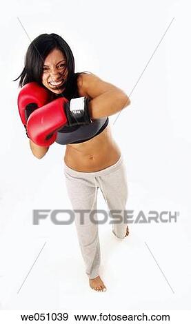 Latin woman at gym View Large Photo Image Stock Photo - Latin woman at gym. Fotosearch