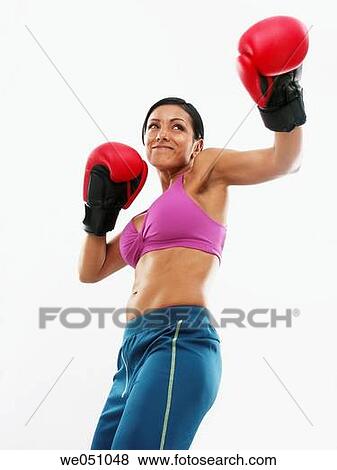 Stock Photo - Latin woman at gym. Fotosearch