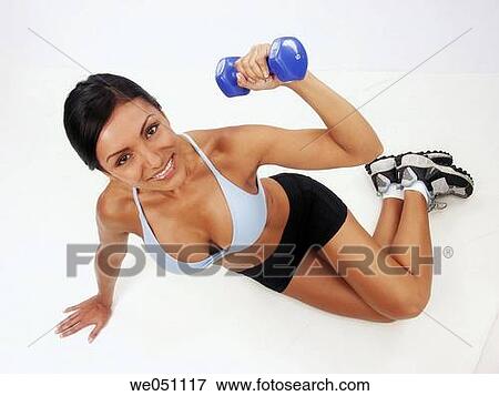 Latin woman at gym View Large Photo Image Stock Photo - Latin woman at gym. Fotosearch
