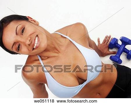 Latin woman at gym View Large Photo Image Stock Photo - Latin woman at gym. Fotosearch