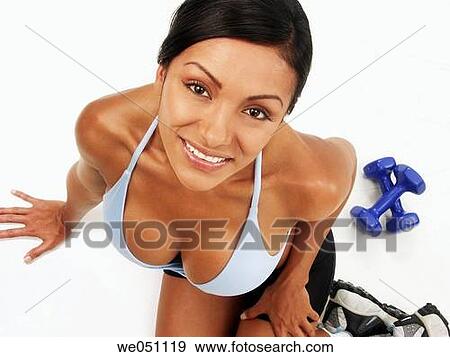 Latin woman at gym View Large Photo Image Stock Photo - Latin woman at gym. Fotosearch