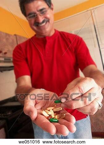 Man taking pills. View Large Photo Image Stock Photograph - Man taking pills.. Fotosearch
