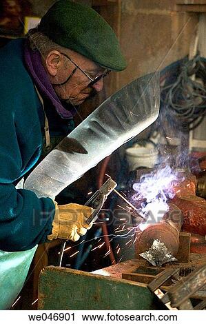 Man welding. Lurcy-Levis. France View Large Photo Image Stock Image - Man welding. Lurcy-Levis. France. Fotosearch