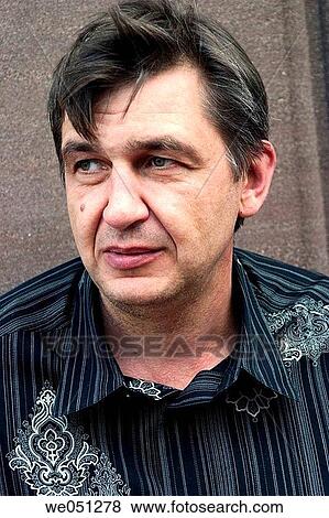 Middle-age man posing View Large Photo Image Stock Photo - Middle-age man posing. Fotosearch